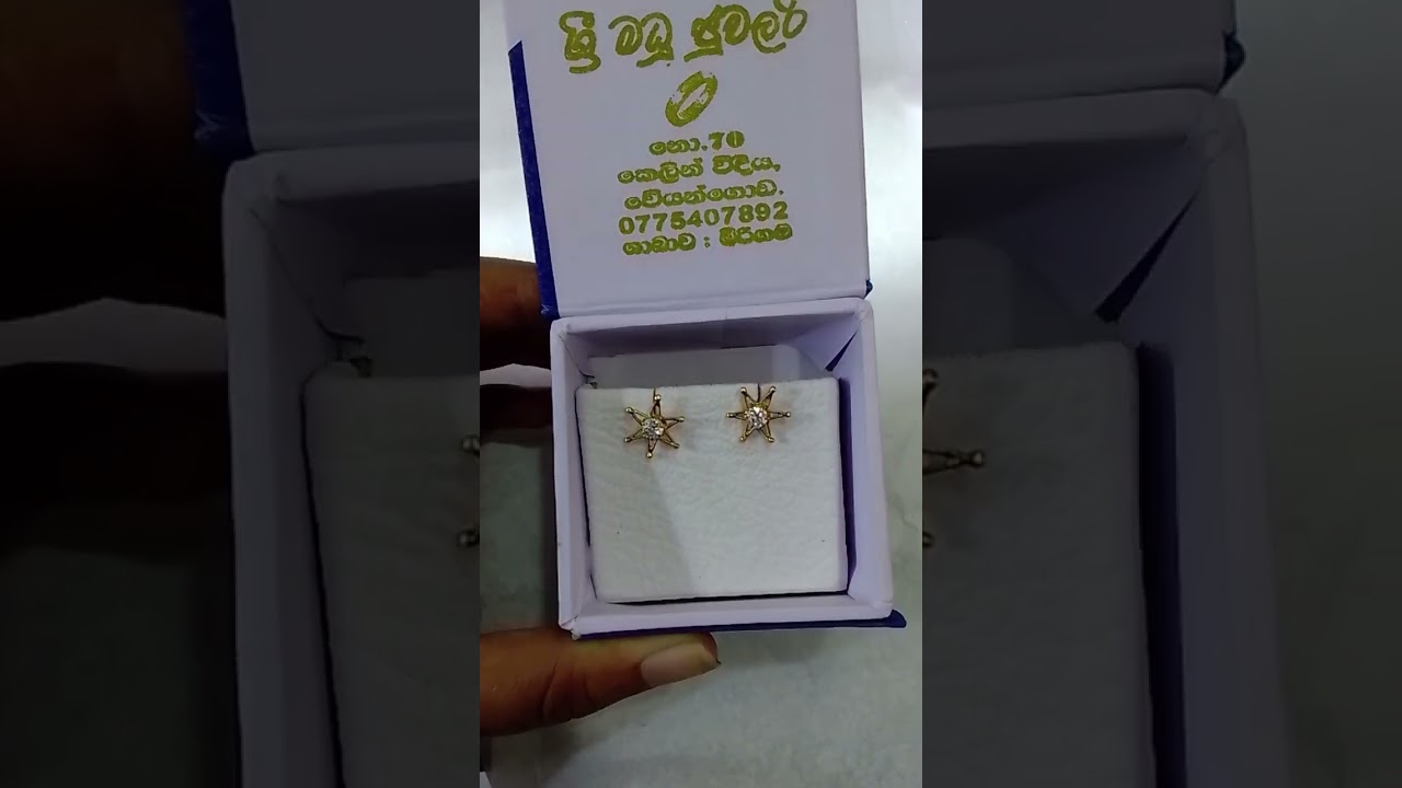 Gold star earrings
