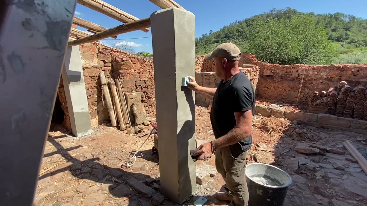 Rendering the pillars and old bricked in door | Courtyard renovation.