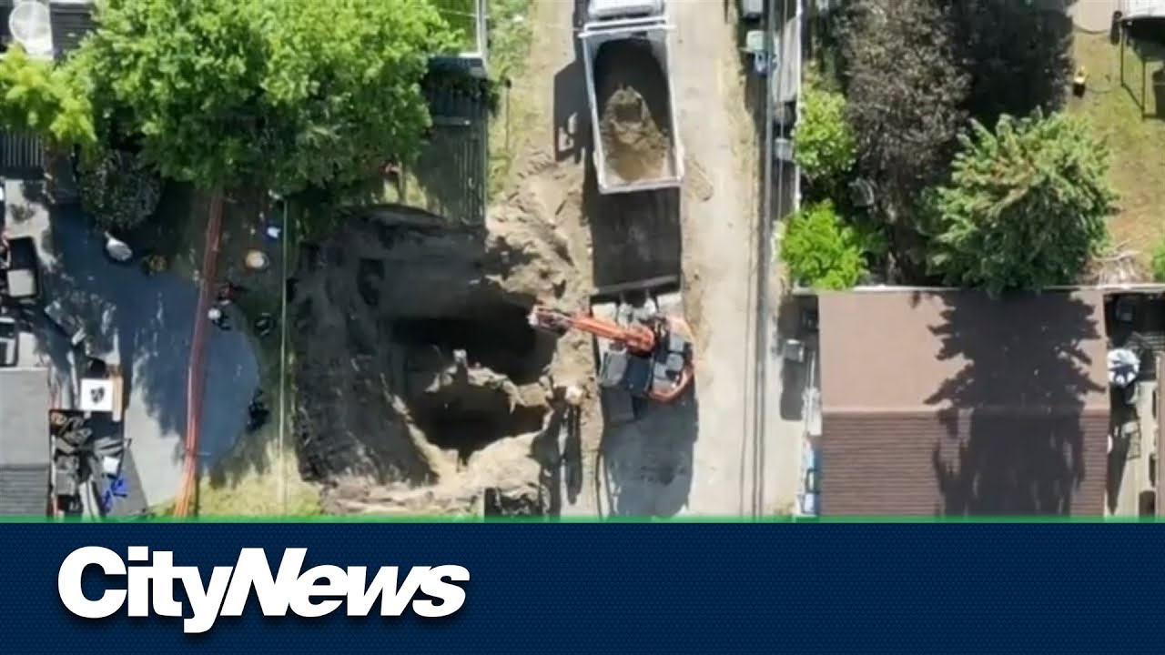 Calgary trench collapse traps one person