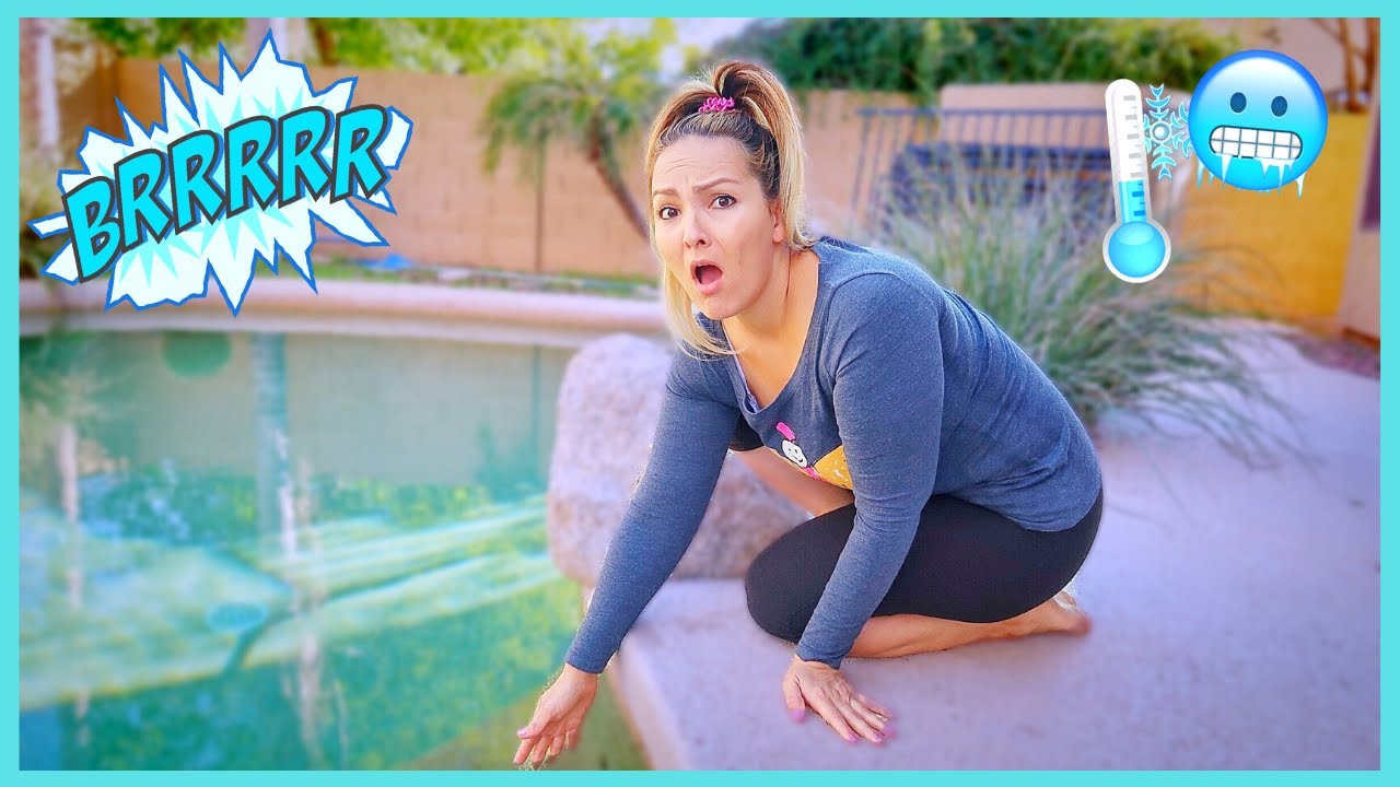 JUMPING INTO THE FREEZING COLD SWIMMING POOL!!! (SHE LOST THE CHALLENGE) 🥶