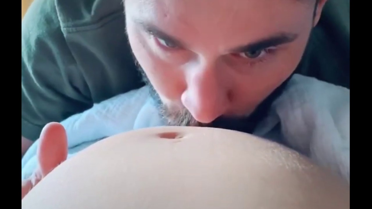 Husband making noises on pregnant wife’s belly and the baby moves every time.