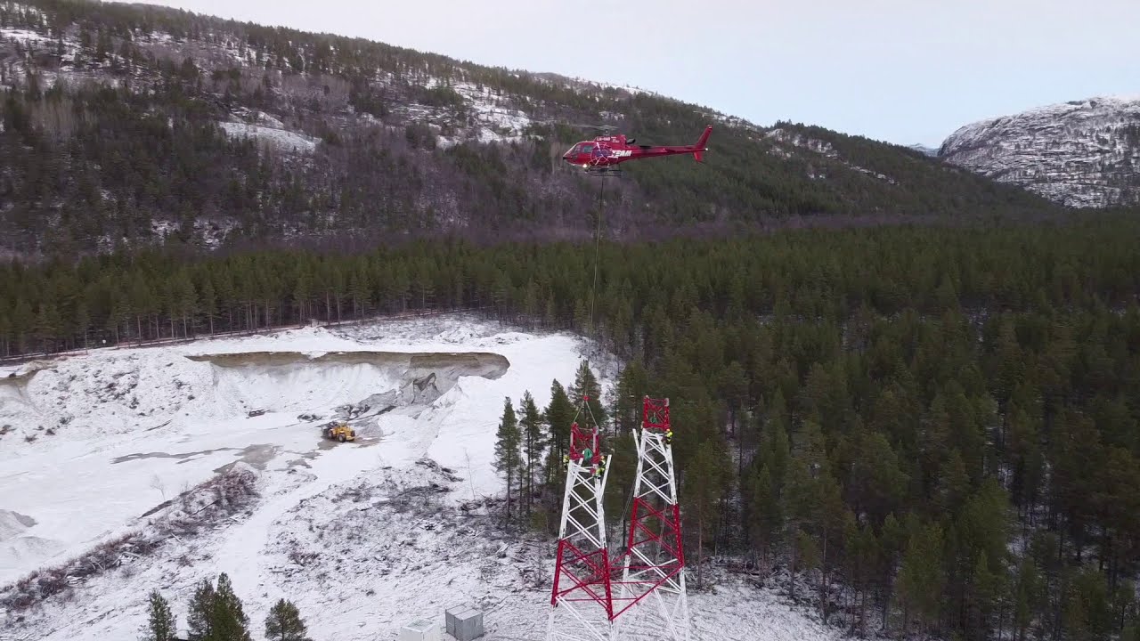 Helicopter Airbus building power line in Norway for Statnett A