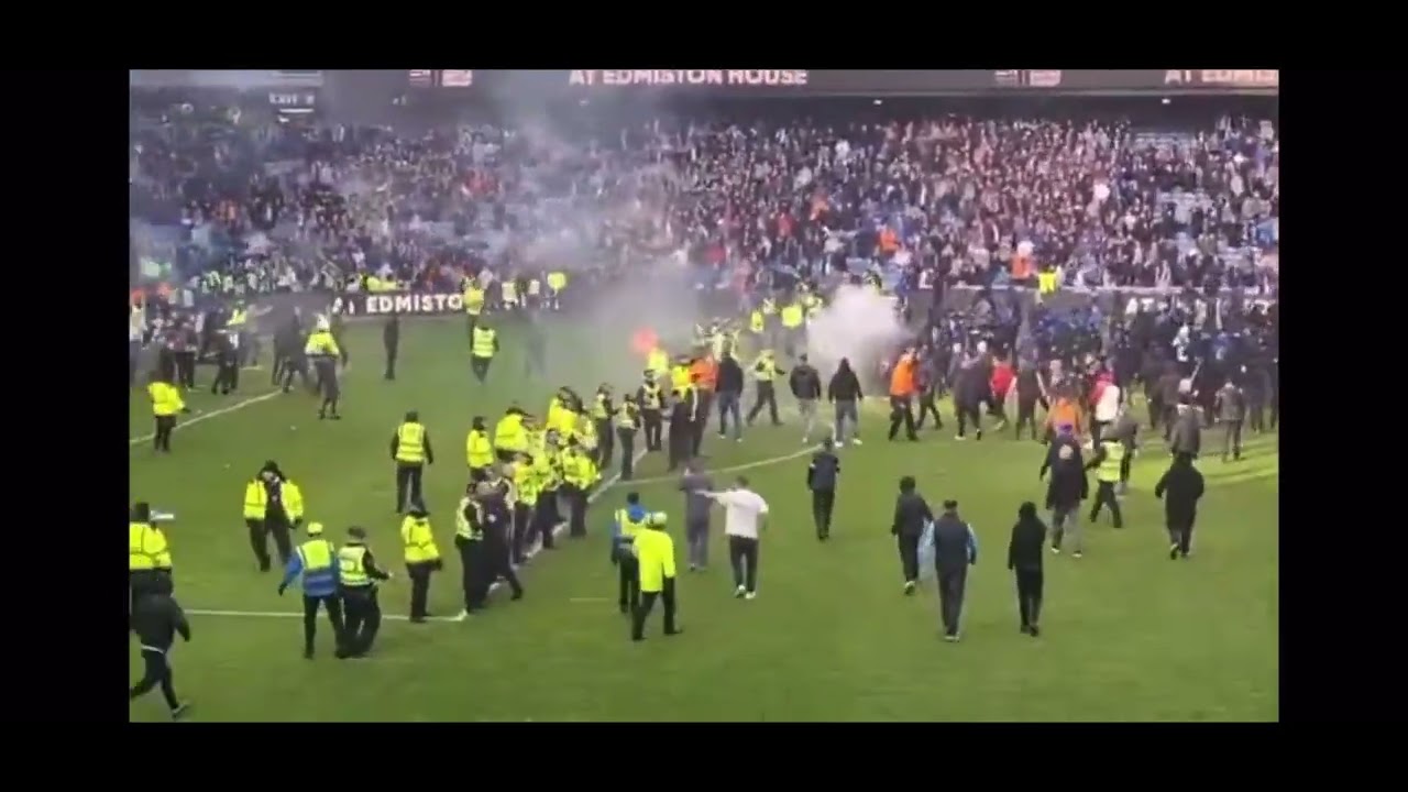 Rangers v Celtic pitch invasion at Ibrox cup tie 🙄