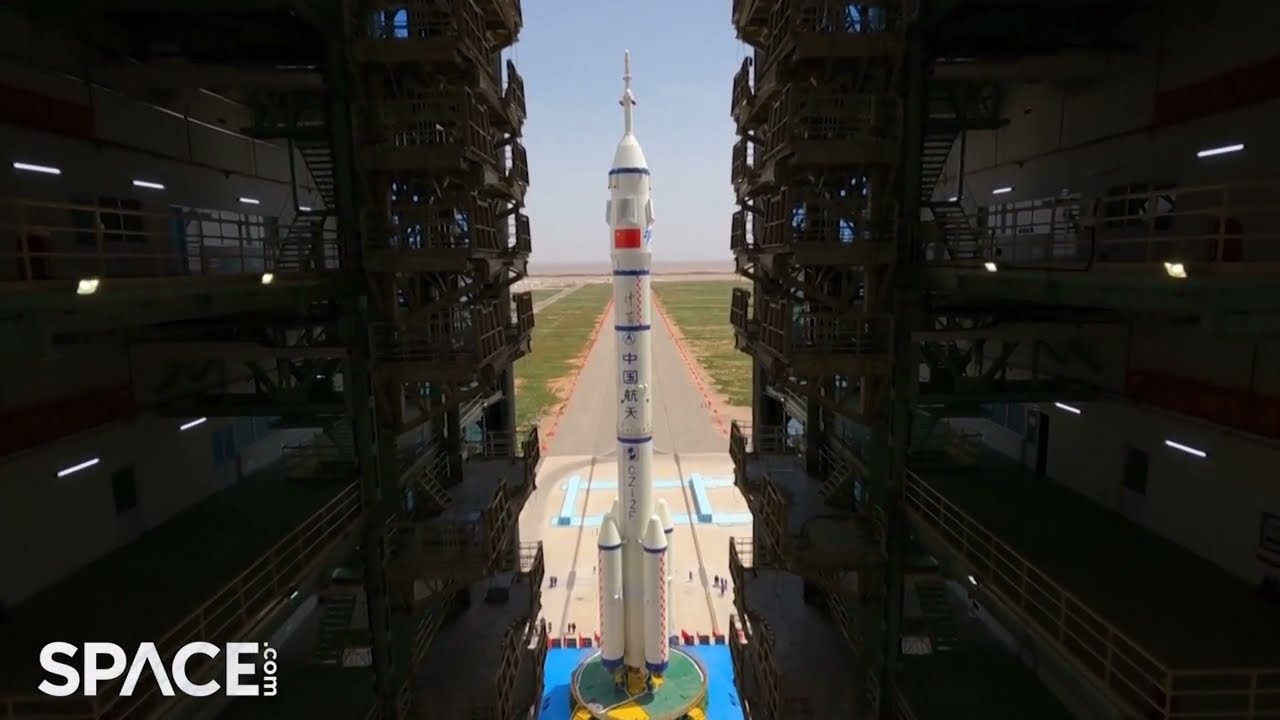 China rolls out Shenzhou 16 crew's rocket in awesome views from launch site