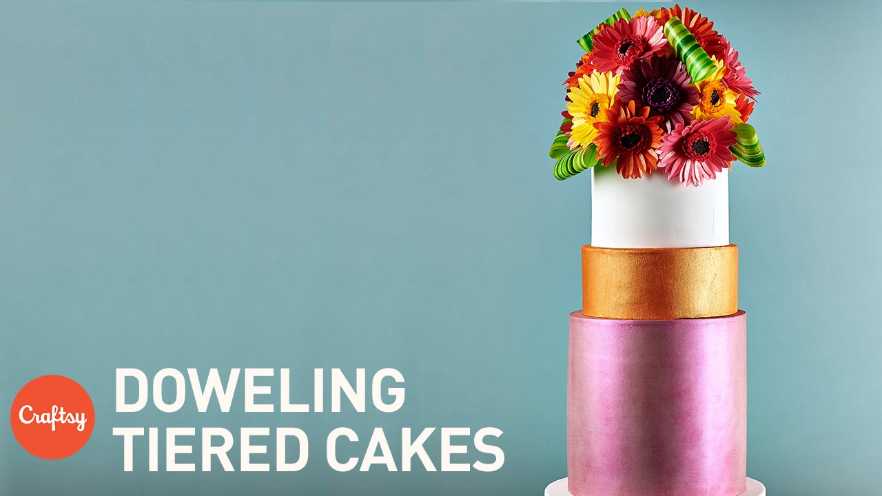 Stacking (Doweling) a Tiered Cake | Professional Cake Decorating Tips from Kara Andretta