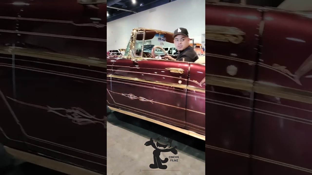 couple clean 57 Raggies from HighClass Cc rolling in to set up at the LowRider Magazine Super Show