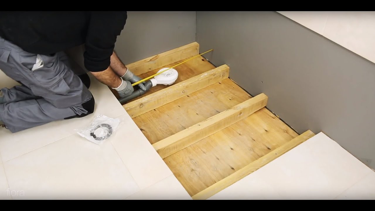 Instalación de plato de ducha sobre timber floor