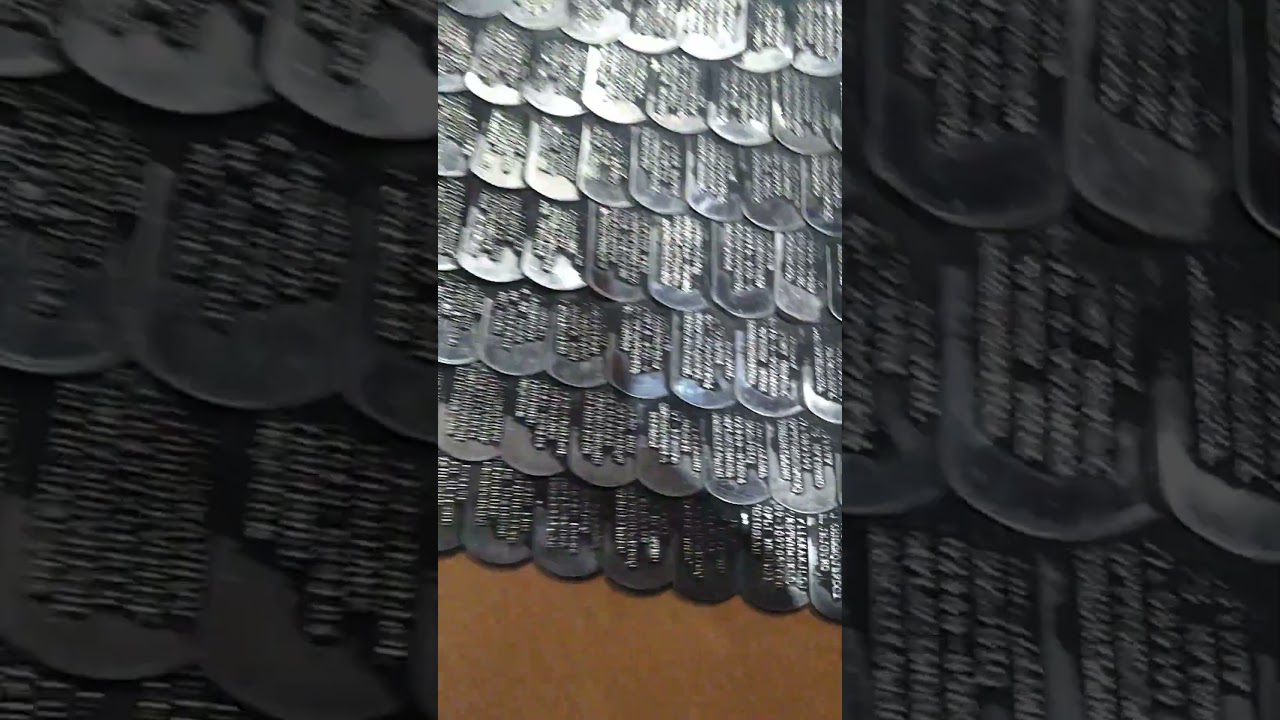 Made from dog tags. not veteran dog tags.