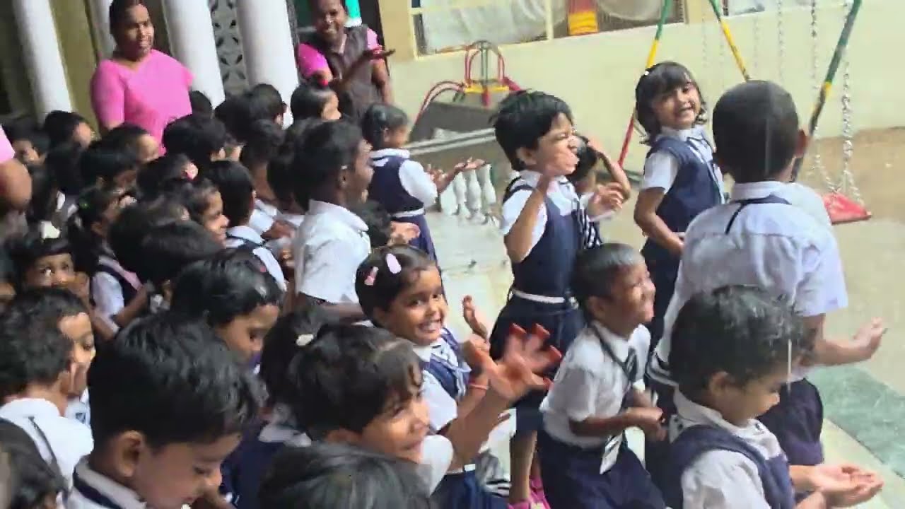 When it rains, our tiny tots dance with joy! 🌧️👣 Pure happiness in every drop!