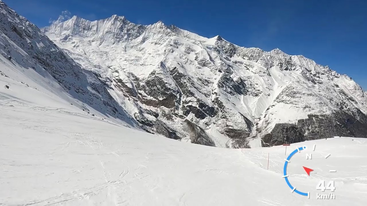 Saas Fee with amazing views of Dom (4545m): Skiing from Plattjen to Saas Fee in March 2023