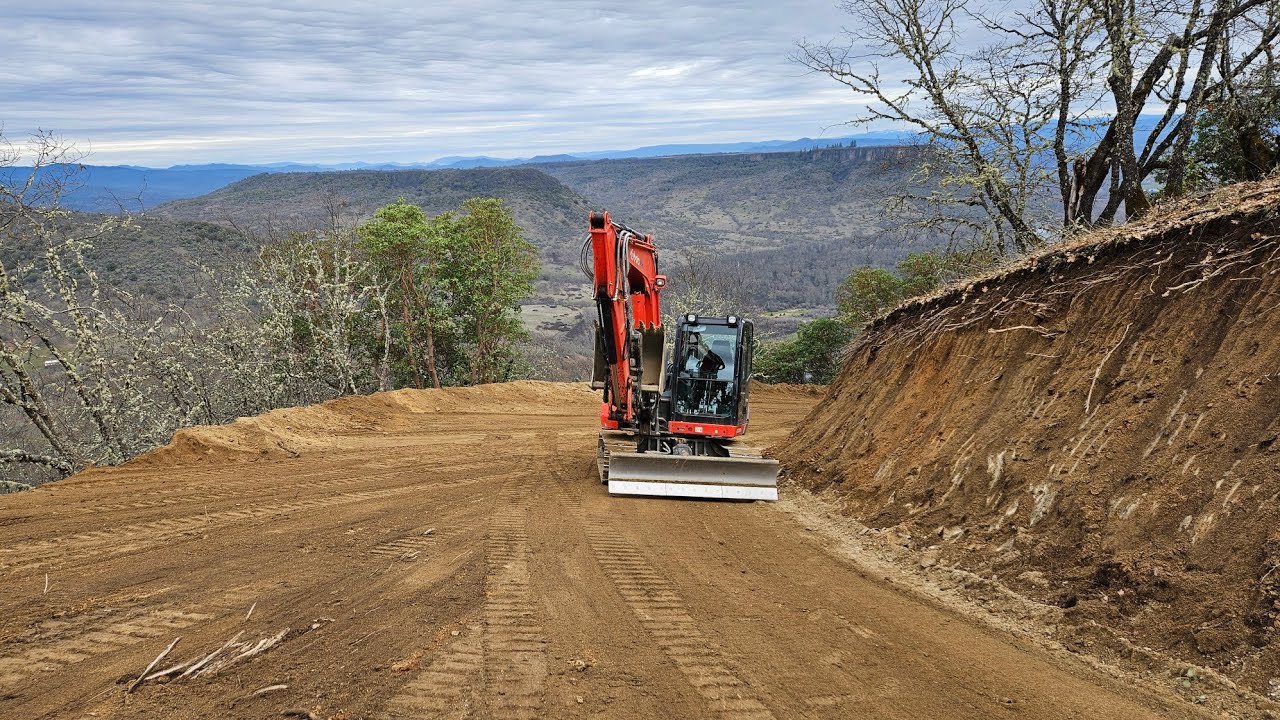Making some changes at the top with the Kubota KX 080 4 excavator
