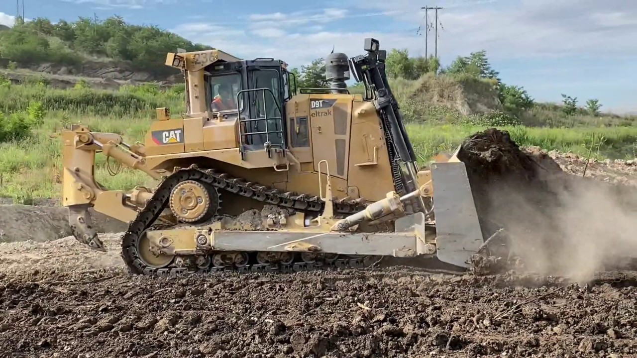Caterpillar D9T Bulldozer Pushing Soil