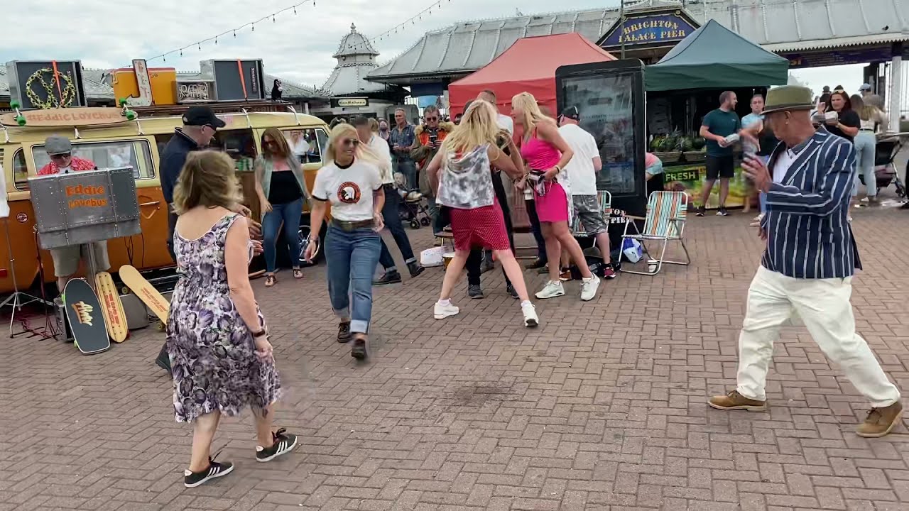 Northern Soul dancing at the VW lovebus on the seafront promenade in Brighton . 28/08/2021