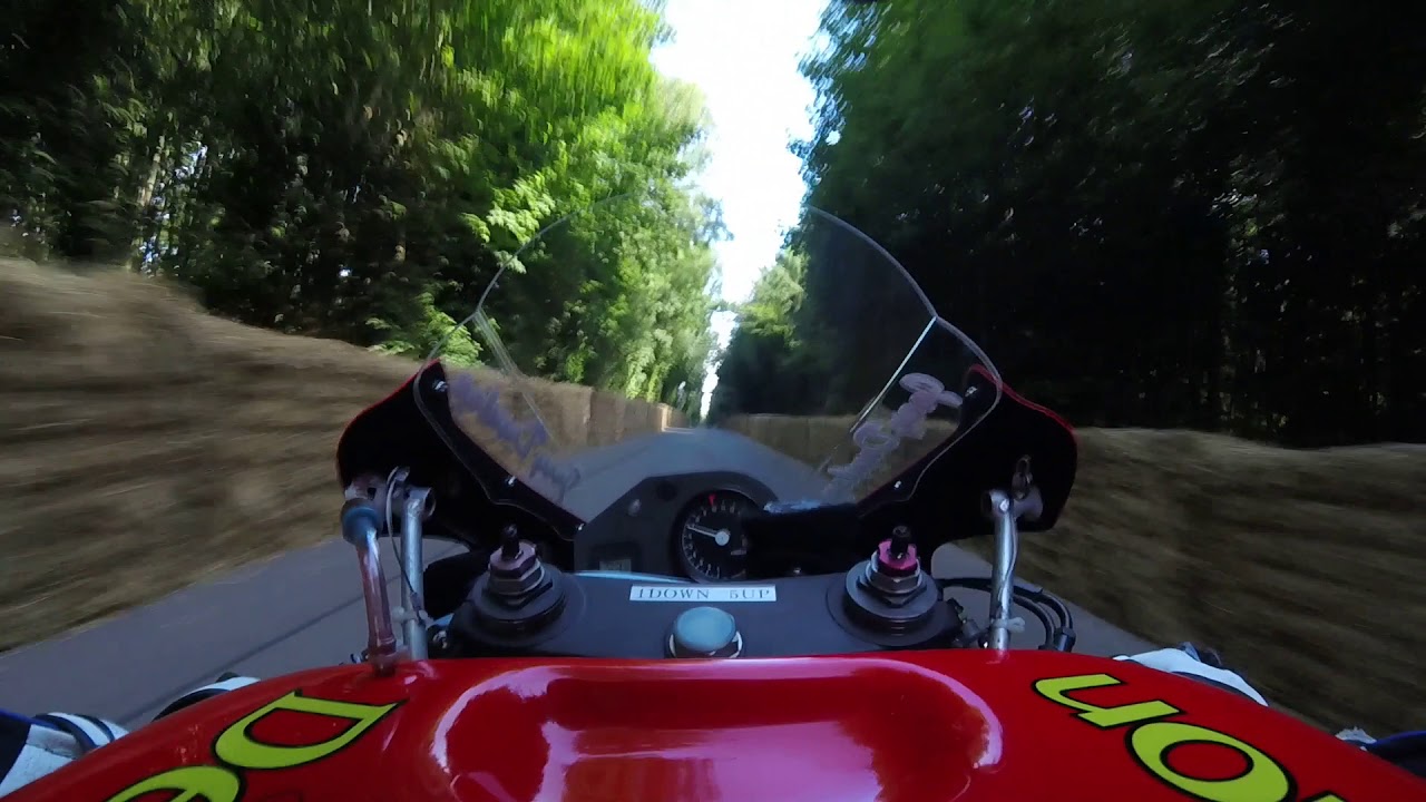 Jenny Tinmouth onboard Joey Dunlops Honda SP1 TT Race bike at Goodwood FOS