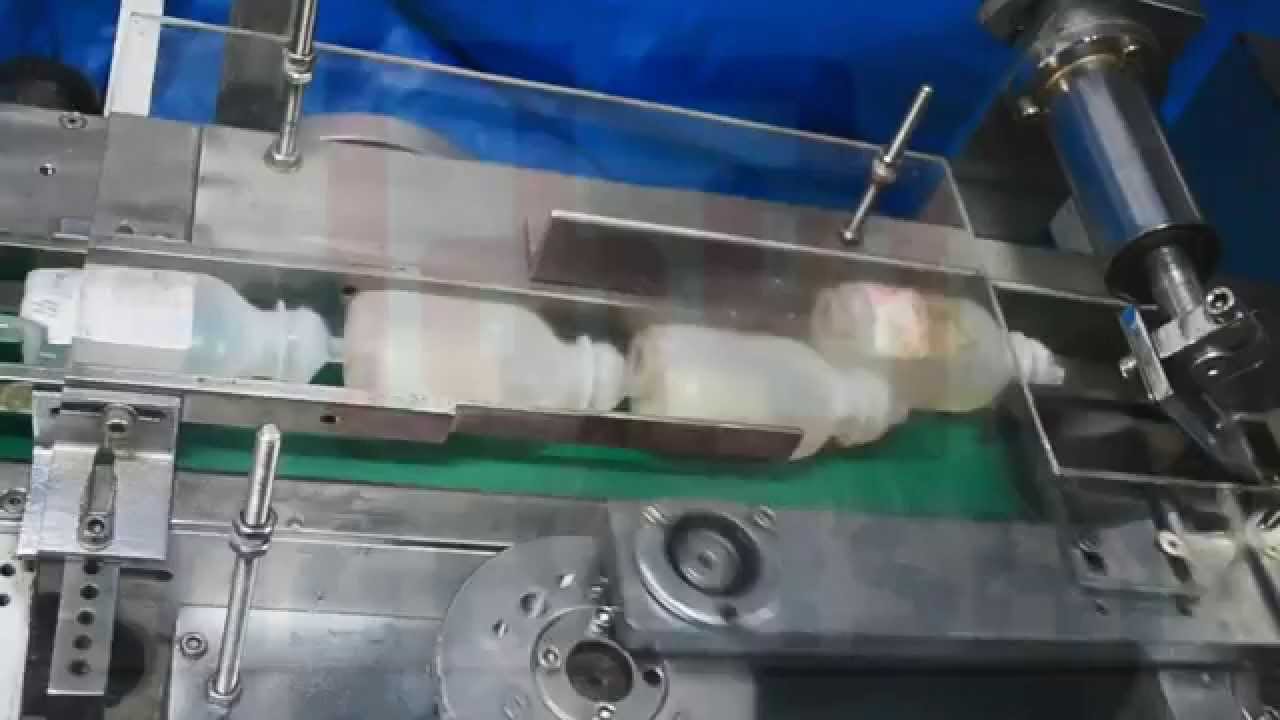 AUTOMATIC FLOW WRAP MACHINE