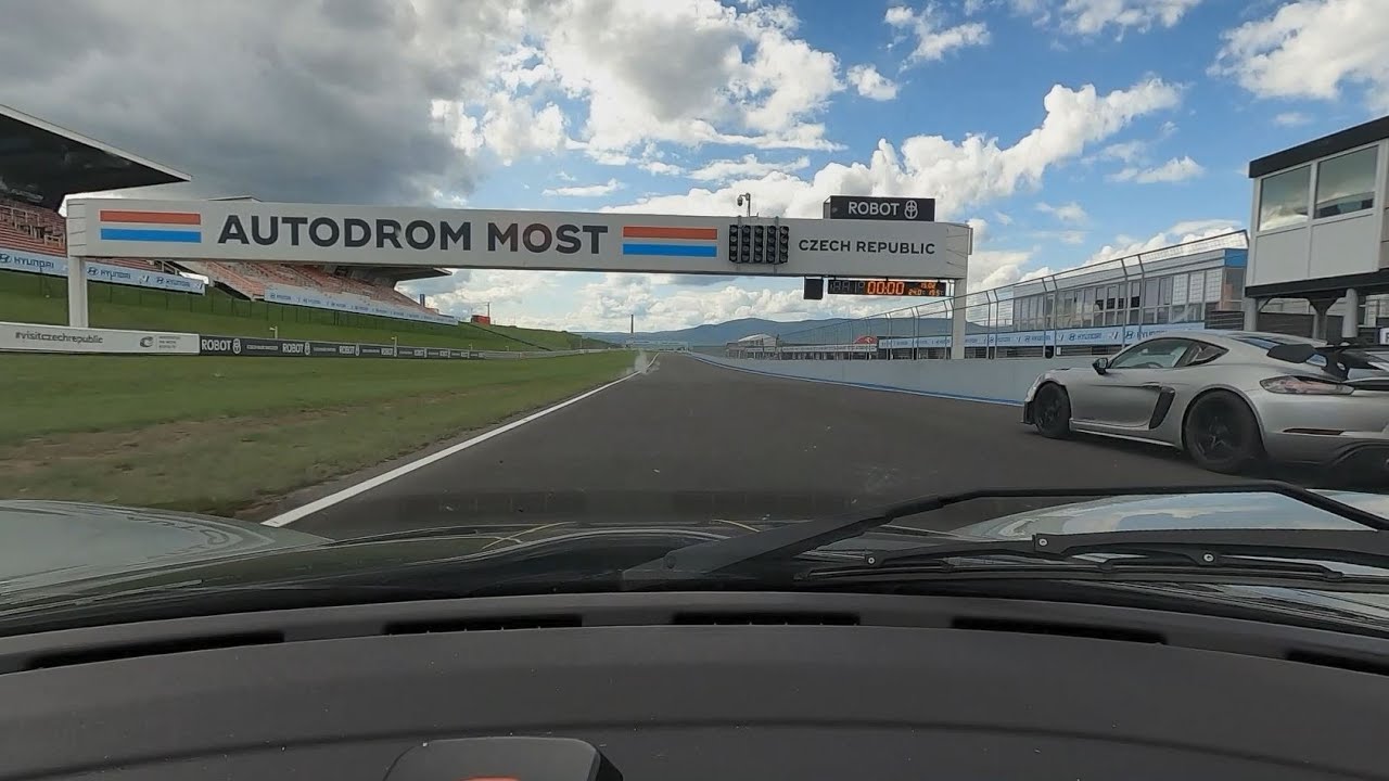 Lotus Exige 420 chasing a Porsche GT4RS | Autodrom Most