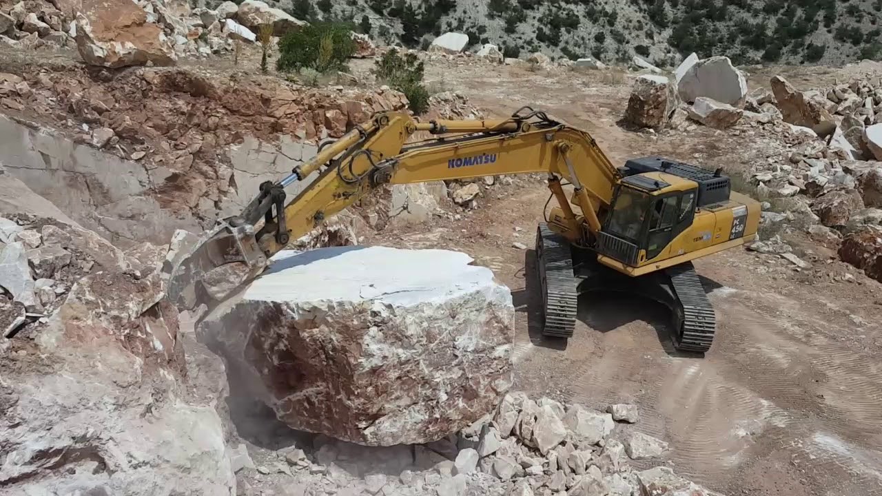 dalil quarry  استخراج كتل الرخام من محجر شركة دليل مرمر