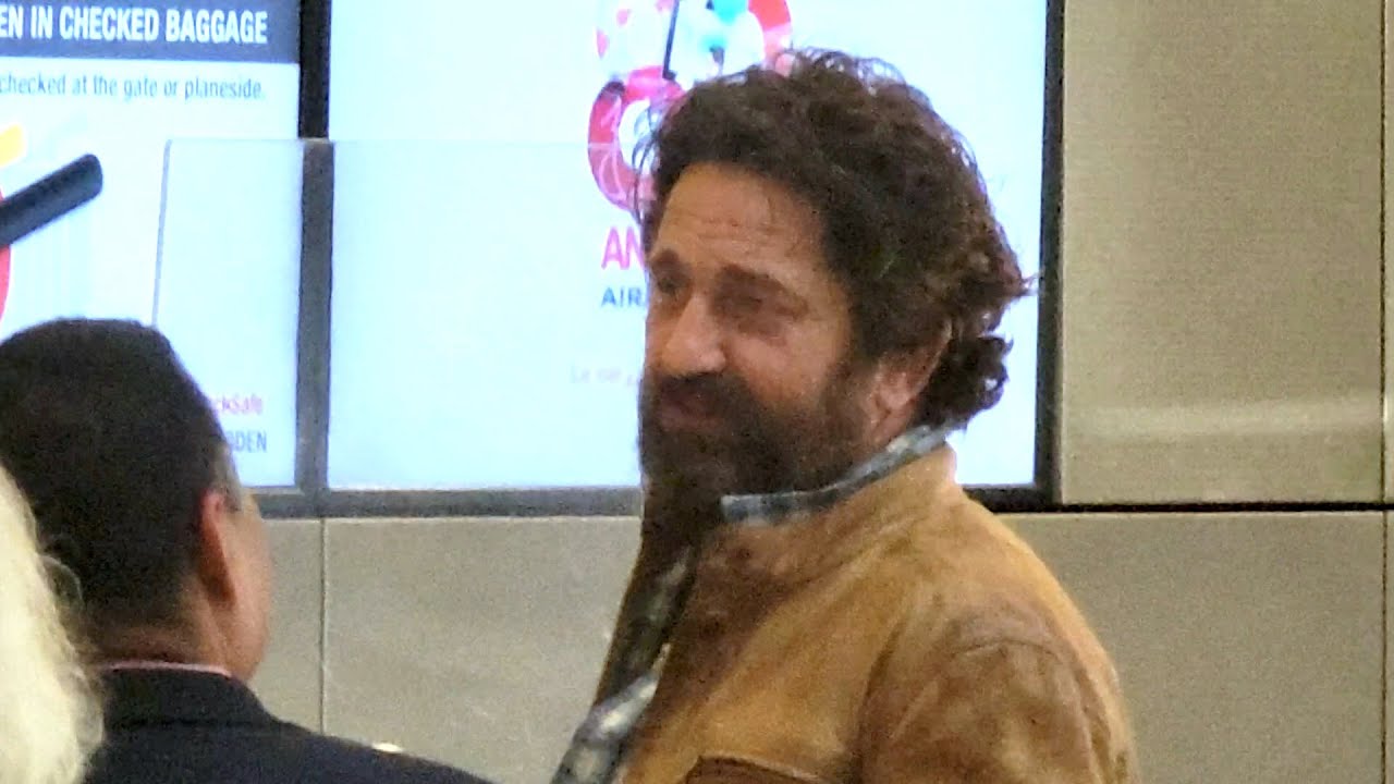 Gerard Butler Cuts A Ruggedly Handsome Frame At LAX