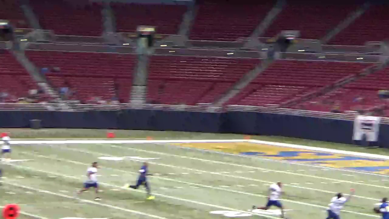 Kurt Warner Throws A Pass To Issac Bruce At Legends Of The Dome