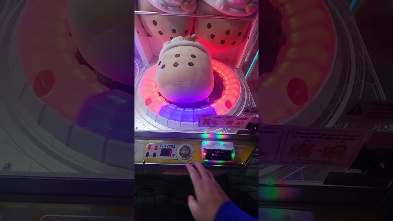 Playing Claw Machines At Round 1 Arcade