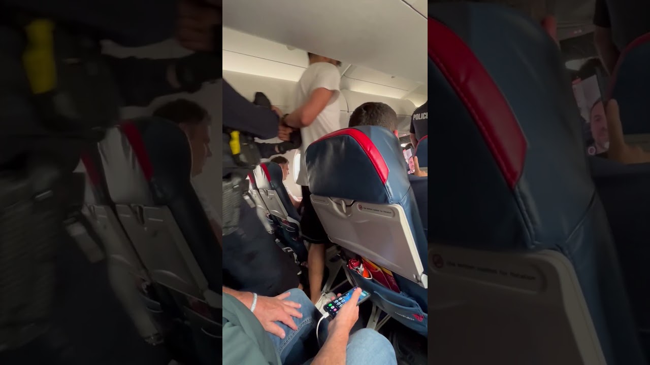 Man Arrested After Attempting to Open Emergency Exit Door Mid-Flight