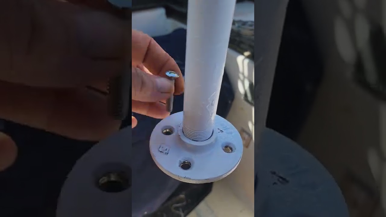 Sailboat 500 watt wind generator mounting pole installation.