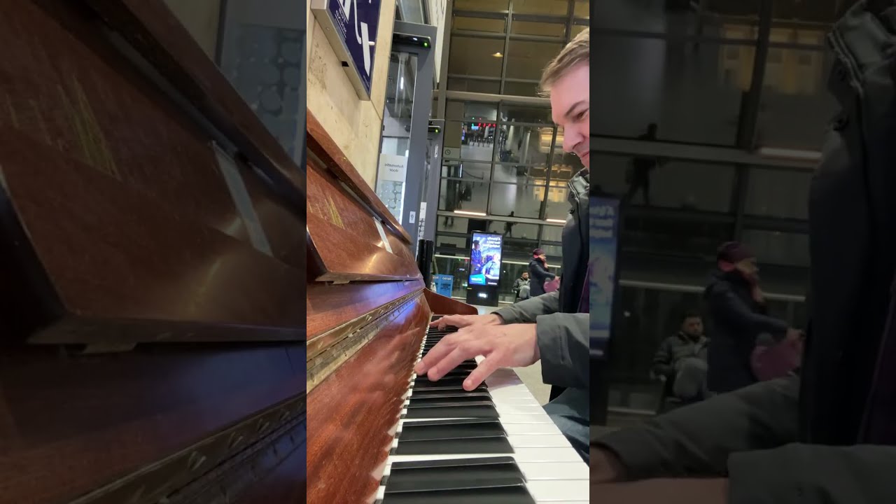 FOR YOU, THERE'LL BE NO MORE CRYING. Songbird on the street piano at Glasgow Queen Street station