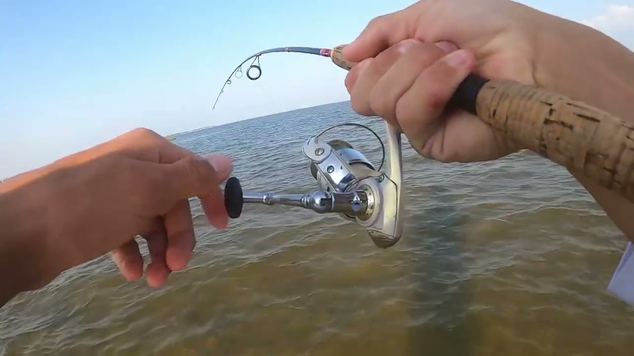 Fishing at St. George Island for Big Redfish on light tackle