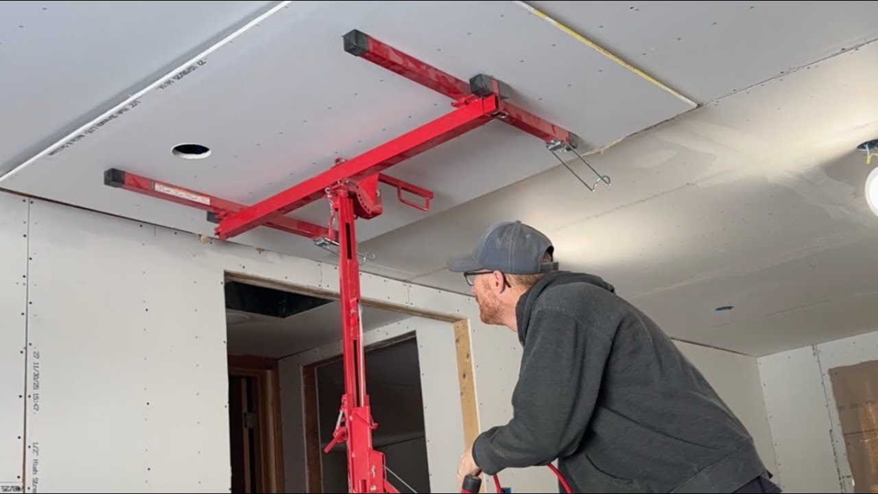 Finally sealing up the holes in the ceiling!  Drywall puzzle pieces. 