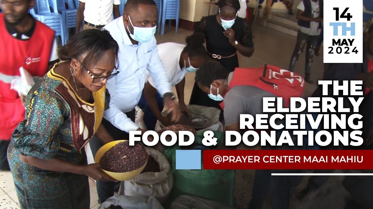 The elderly receiving food & donations from Evangelist Lucy Wa Ngunjiri
