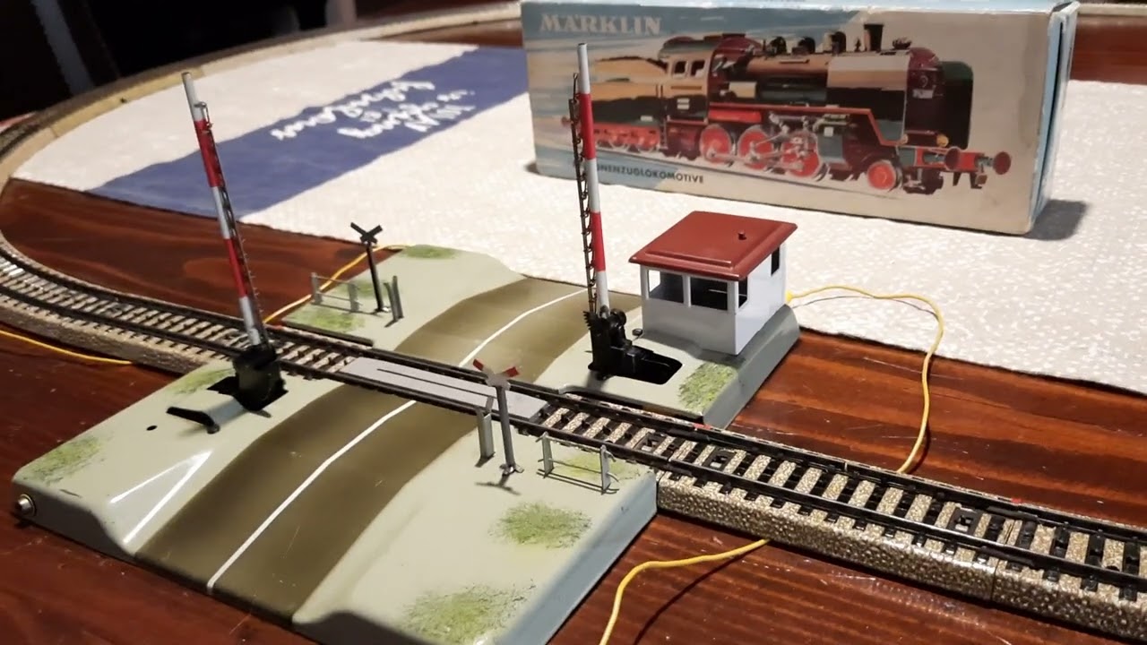 m&auml;rklin 3003 br24 steam 2-6-0 with 7192 rail crossing