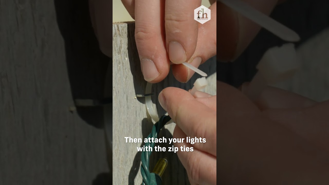 How To Easily Hang Christmas Lights On a Wooden Fence