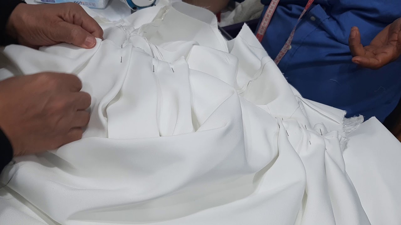 الجزء السادس من فستان الزفاف تركيب الكورساج في الجيبه