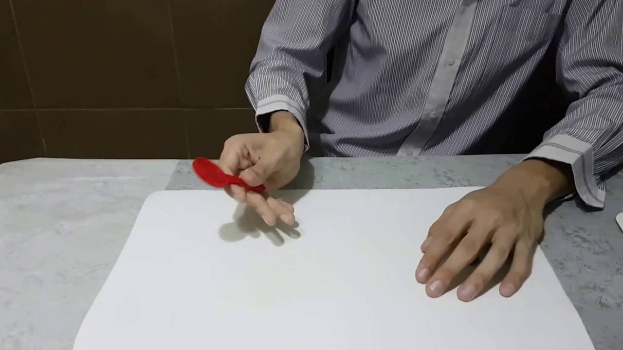 Magic Coin Paddle Trick (Tutorial)