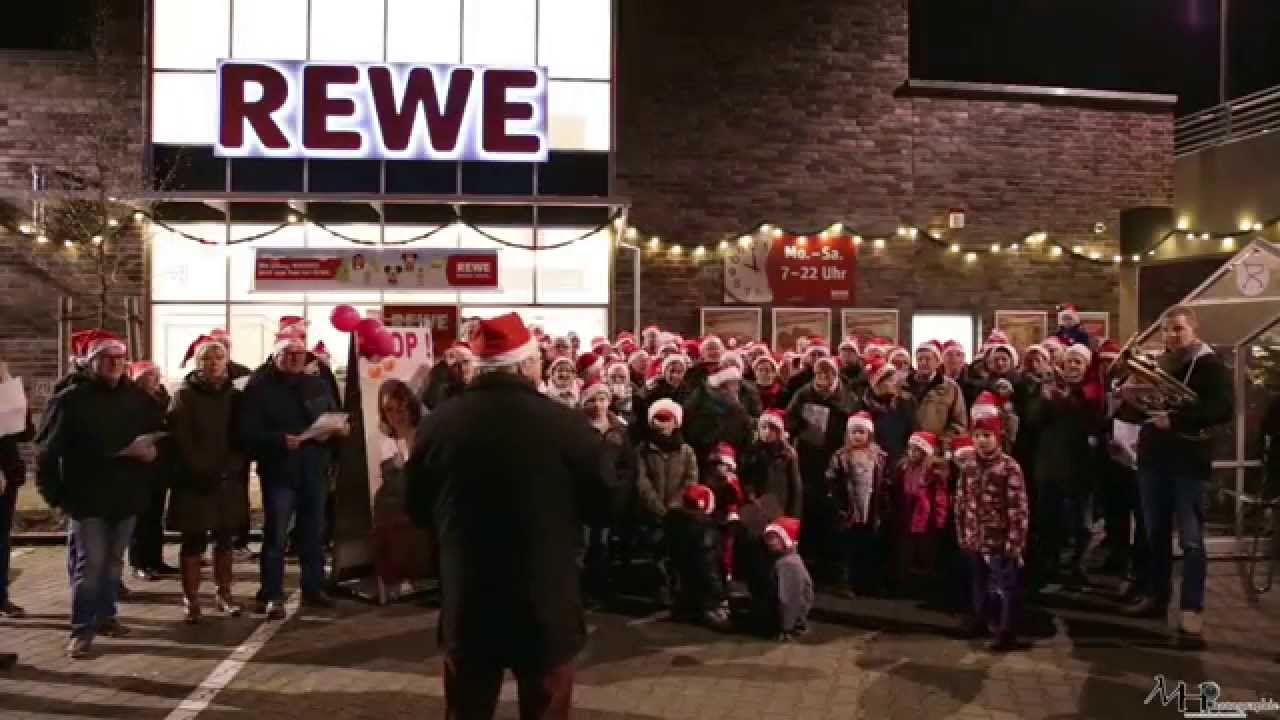 Weihnachtslieder bei REWE - Schützen Singen