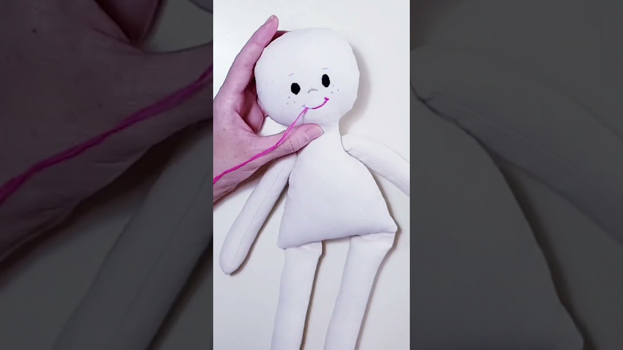 bordando carita de mu&ntilde;eca de tela