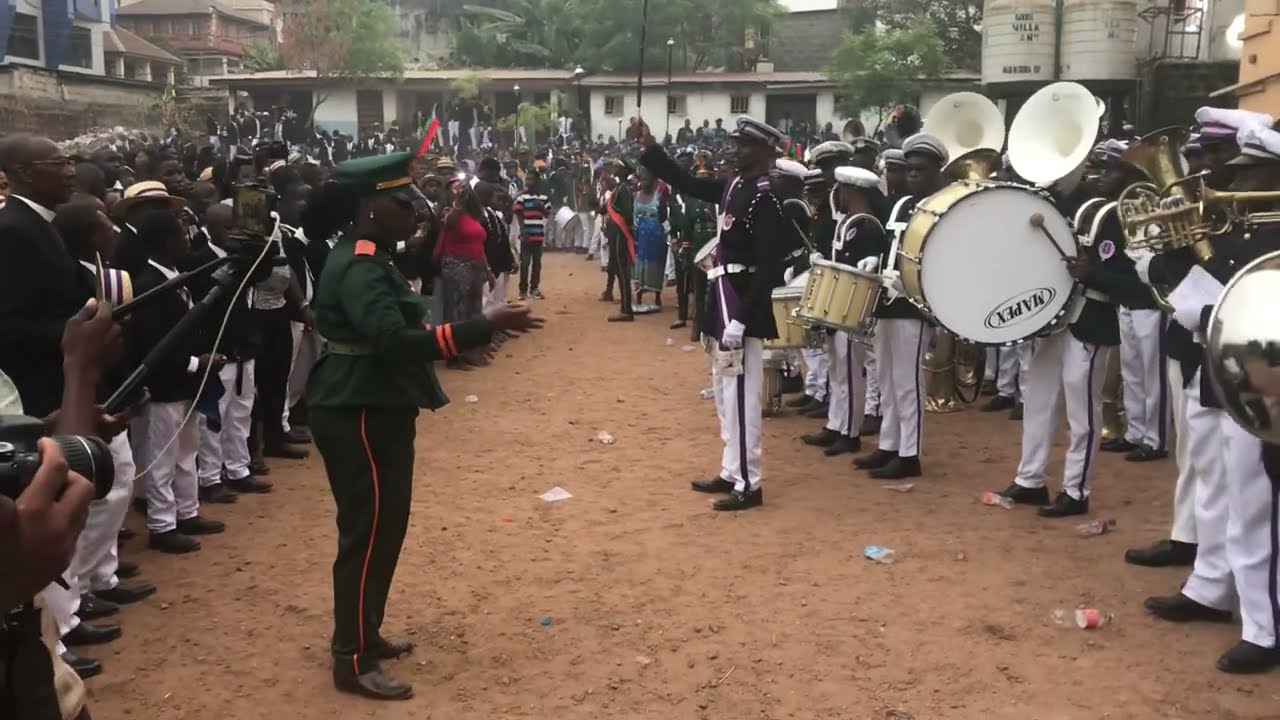 ANNIE WALSH BAND MISTRESS CONDUCTING THE NATIONAL ANTHEM OF SIERRA LEONE 🇸🇱