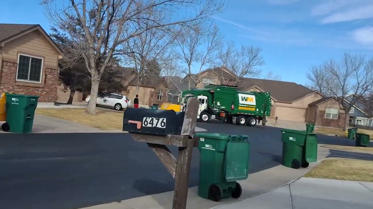 Wm curatto can garbage truck colecting trash in patio home neihborhood (part 1/3)