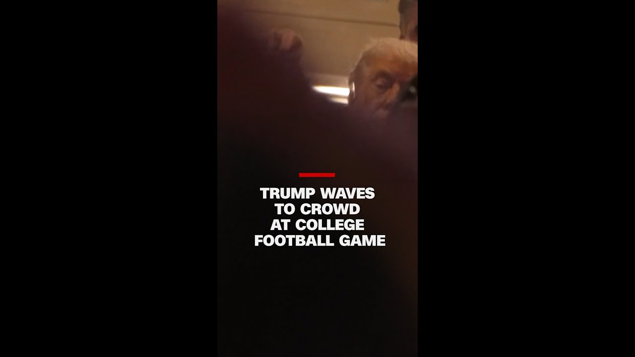 Trump waves to crowd at the College Football National Championship