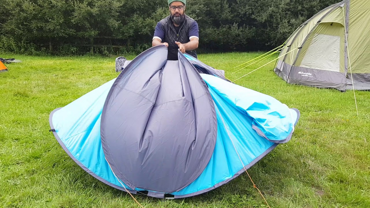 How to fold up a pop up tent.