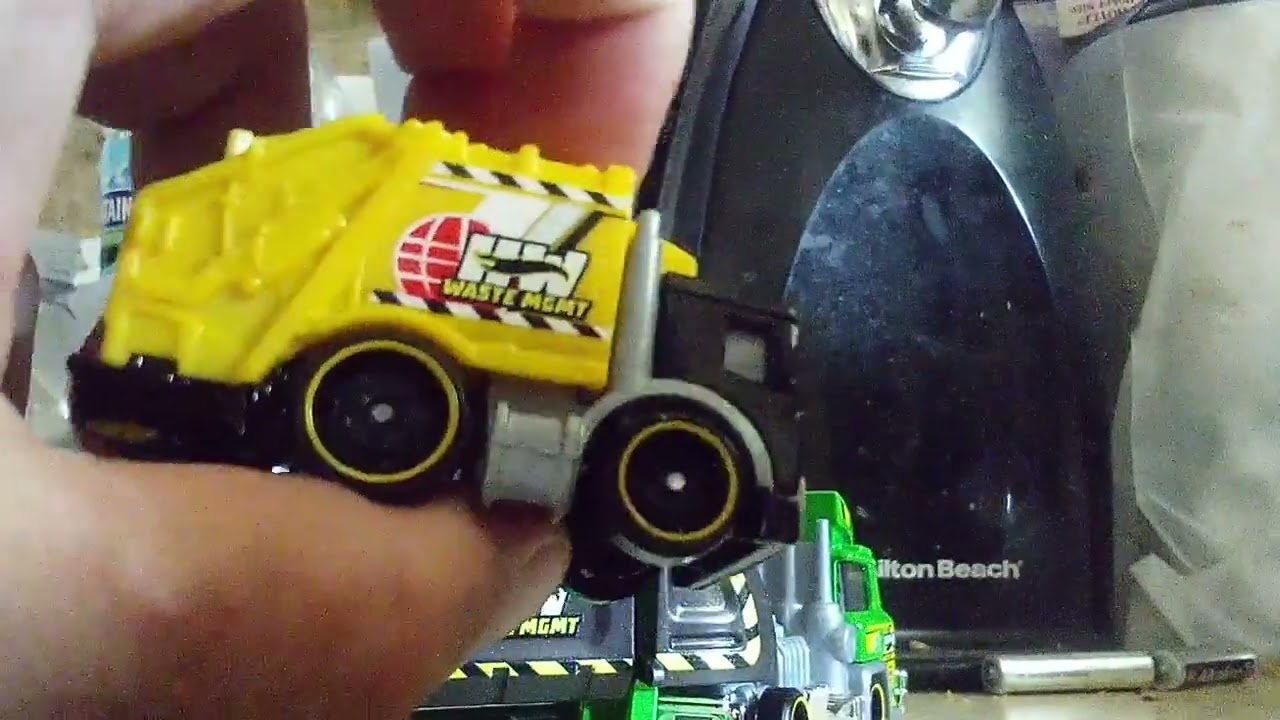 Unboxing a new casting called Trash Basher. Believe or not, this one can fit on Hot Wheels track.