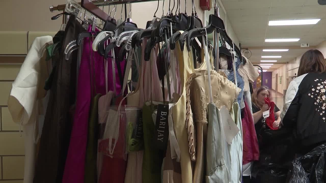 Rising from the ashes: Owner of destroyed bridal shop donates dresses to local clothing closets