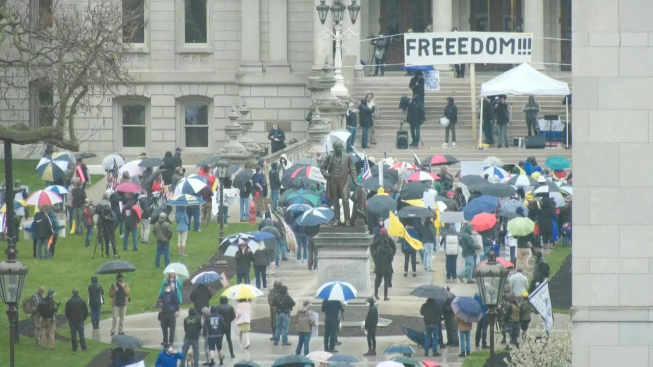 People gather outside Michigan State Capitol for anti-lockdown protest | AFP