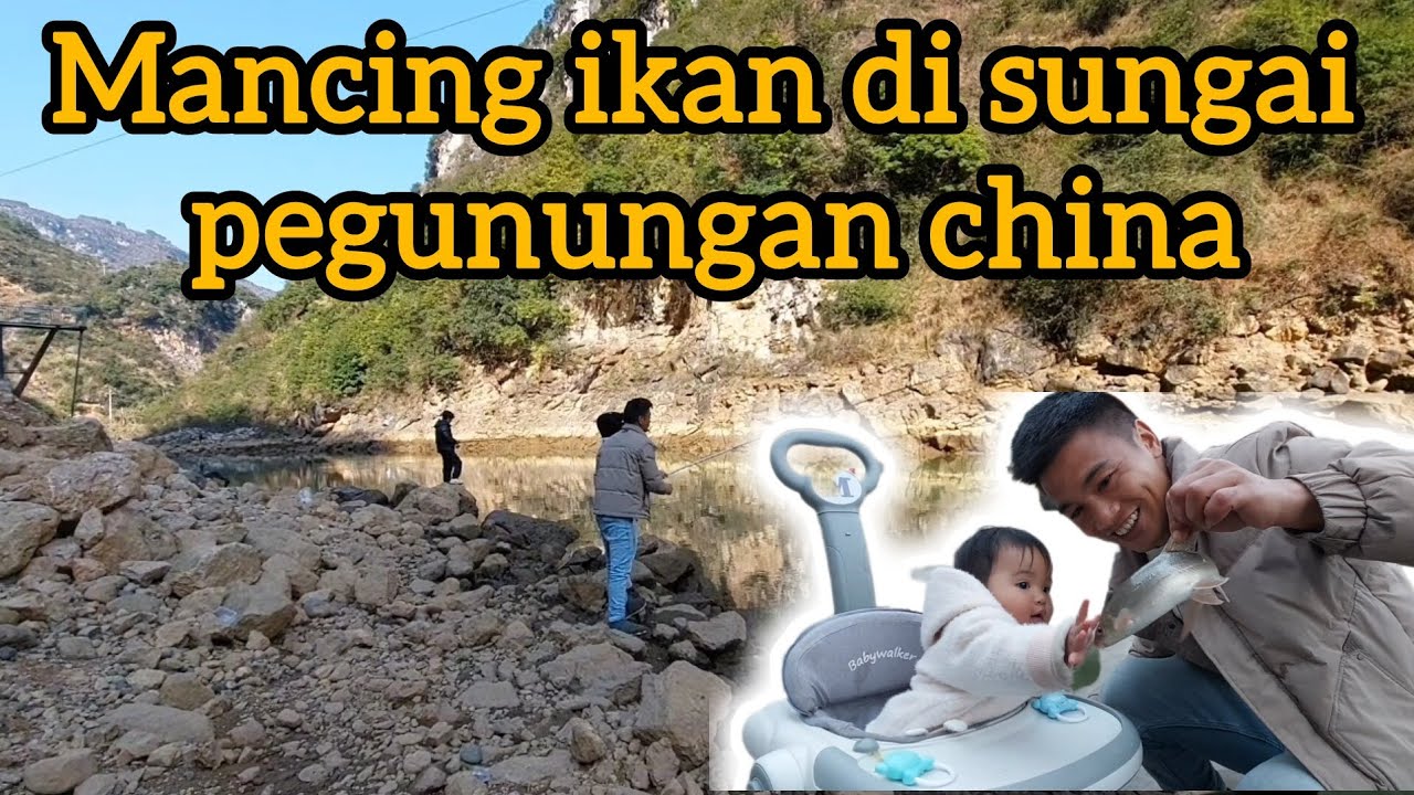 Mendapatkan ikan di sungai pegunungan saat mancing di pedesaan china