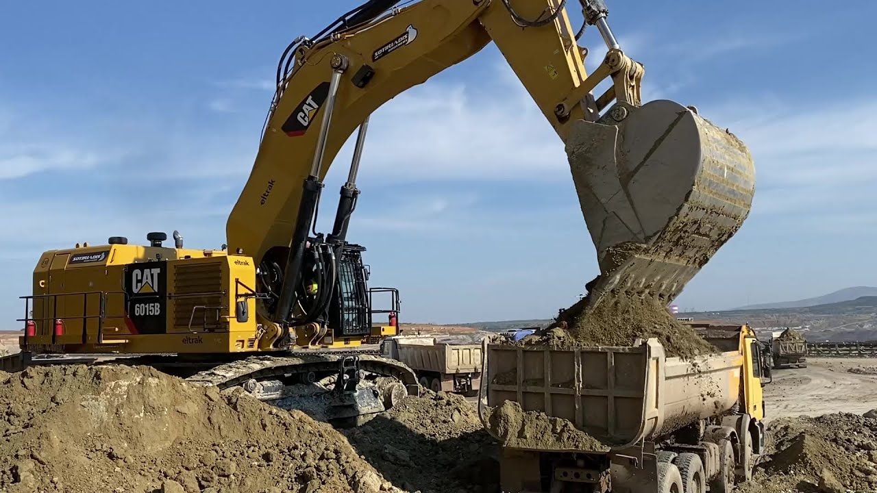 Caterpillar 6015B Excavator Loading Trucks With Two Passes - Sotiriadis Mining Works