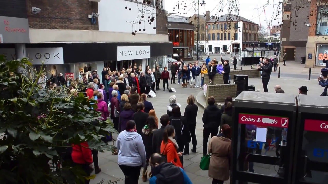 Guildford Godalming rock choir flashmob - Guildford 20/3/2016