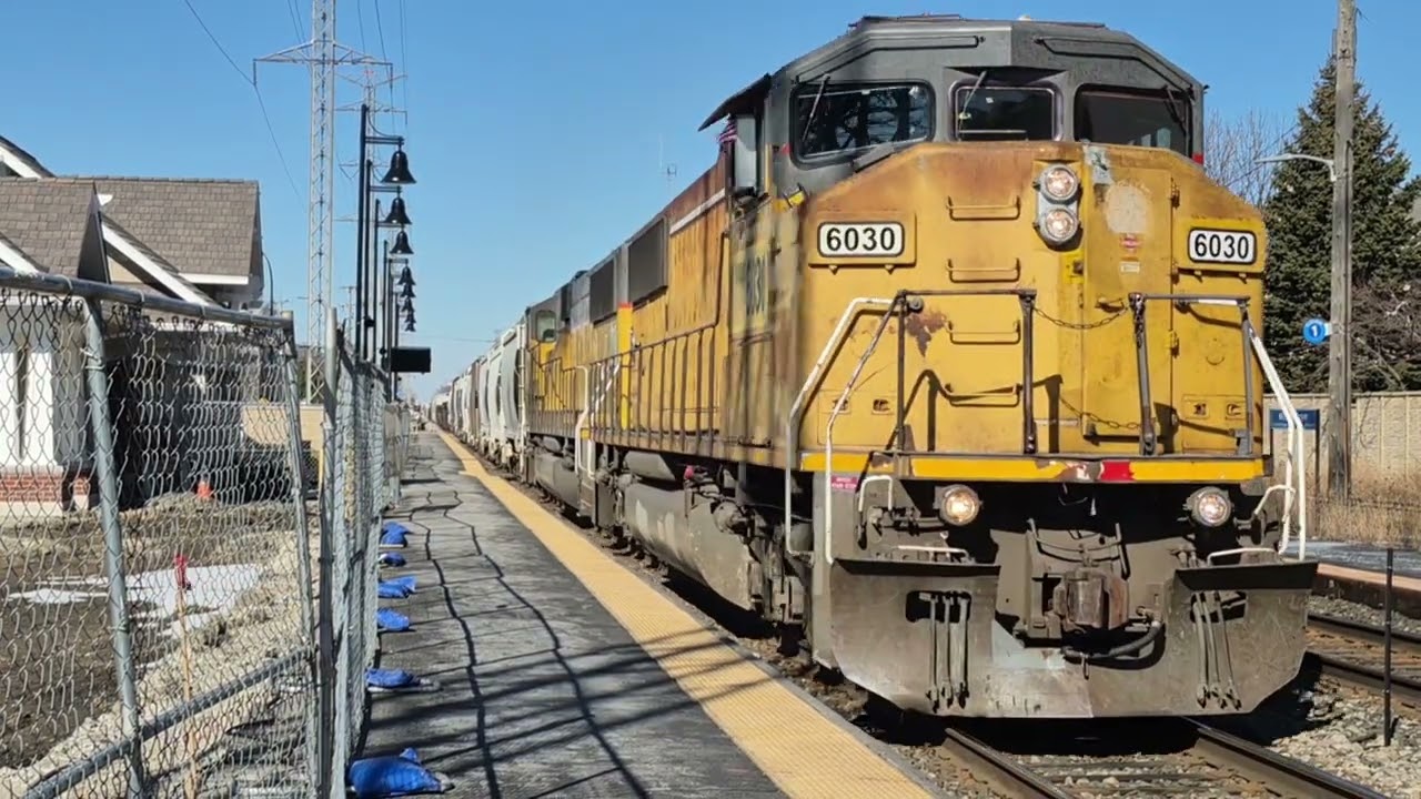 Another daylight WSOR T004 at Morton Grove with Metra/Amtrak action