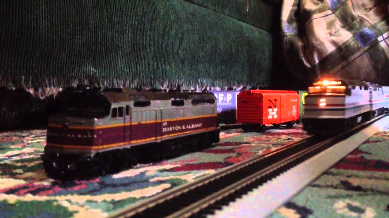 Bachmann Spectrum Amtrak F40s pulling streamlined cars