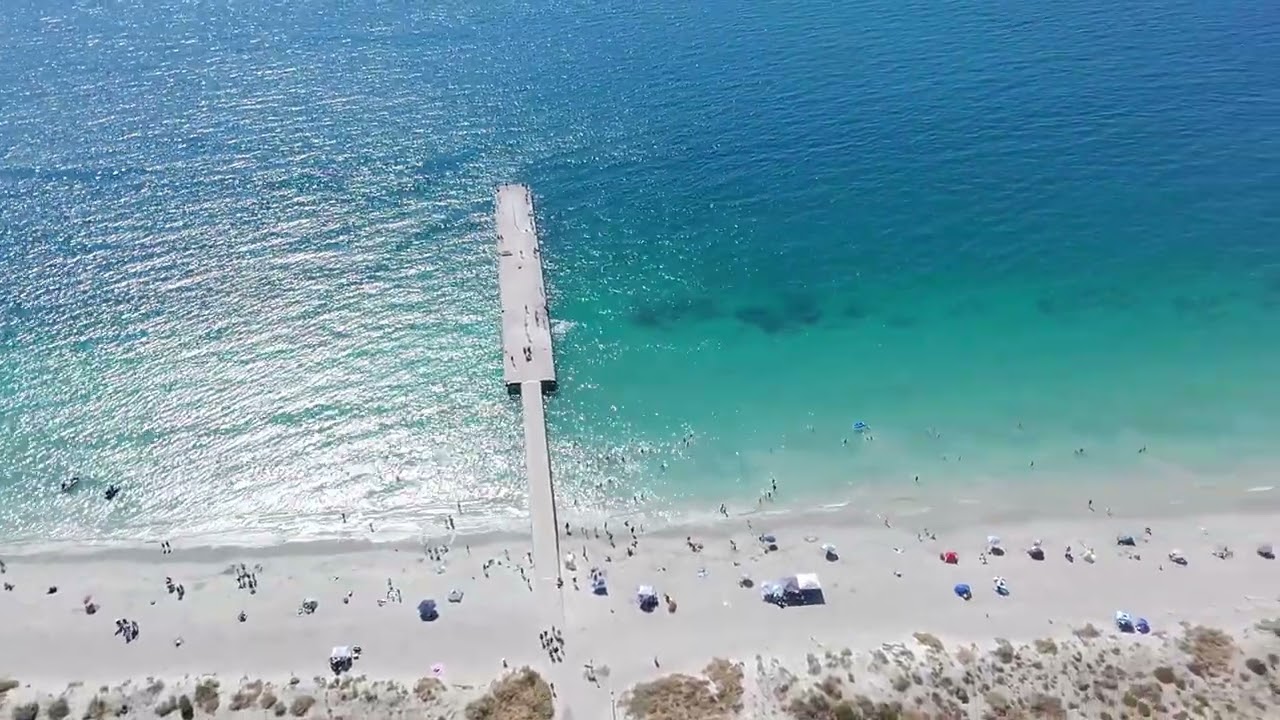 Discover Family Fun and Coastal Charm at Woodman Point: Playground & Beach