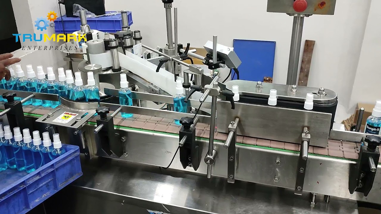 AUTOMATIC BOTTLE LABELING MACHINE